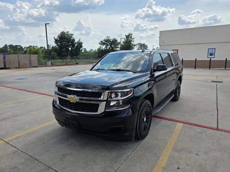 Black 2015 Chevrolet Suburban LS front side photo near Houston TX
