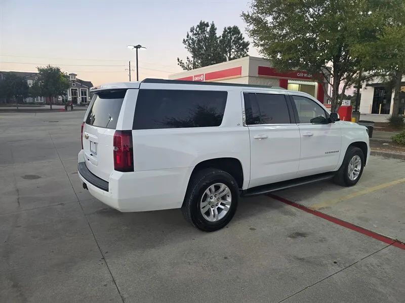 2017 Chevrolet Suburban LT 4WD side view near Houston TX