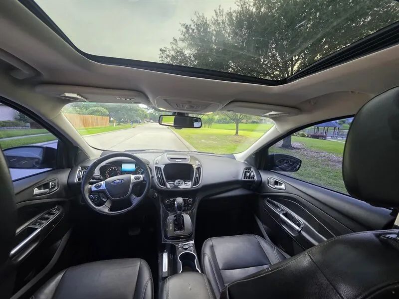 2015 Ford Escape Titanium dashboard and panoramic roof near Houston TX