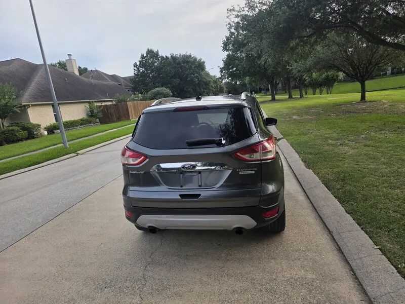 2015 Ford Escape Titanium rear liftgate and badge view near Houston TX