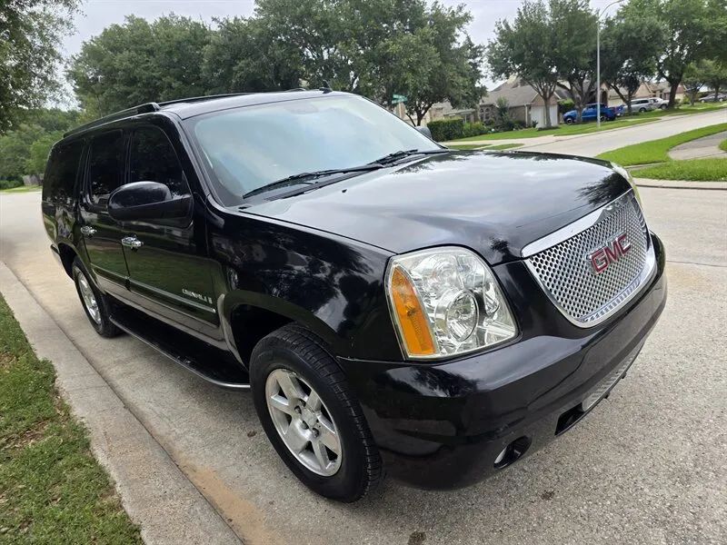 Used GMC Yukon XL Denali side exterior photo near Houston TX