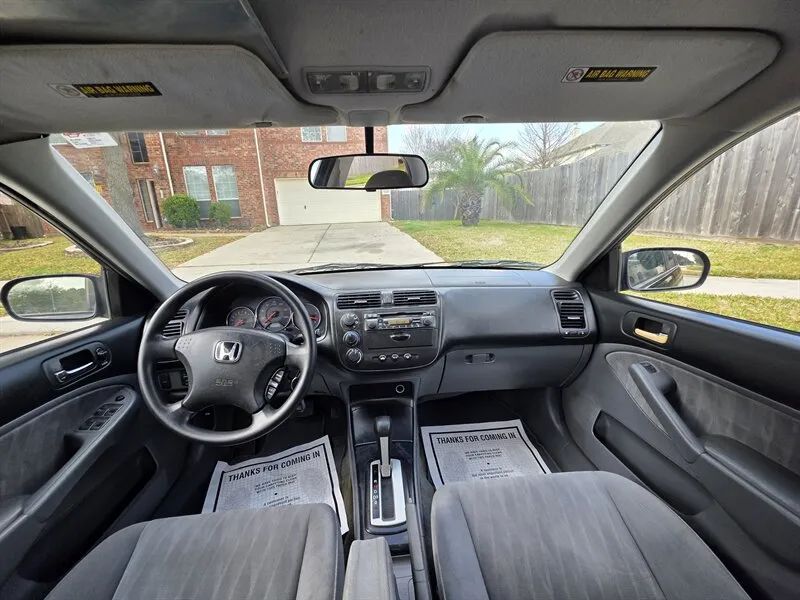 2004 Honda Civic LX dashboard and front cabin near Houston TX