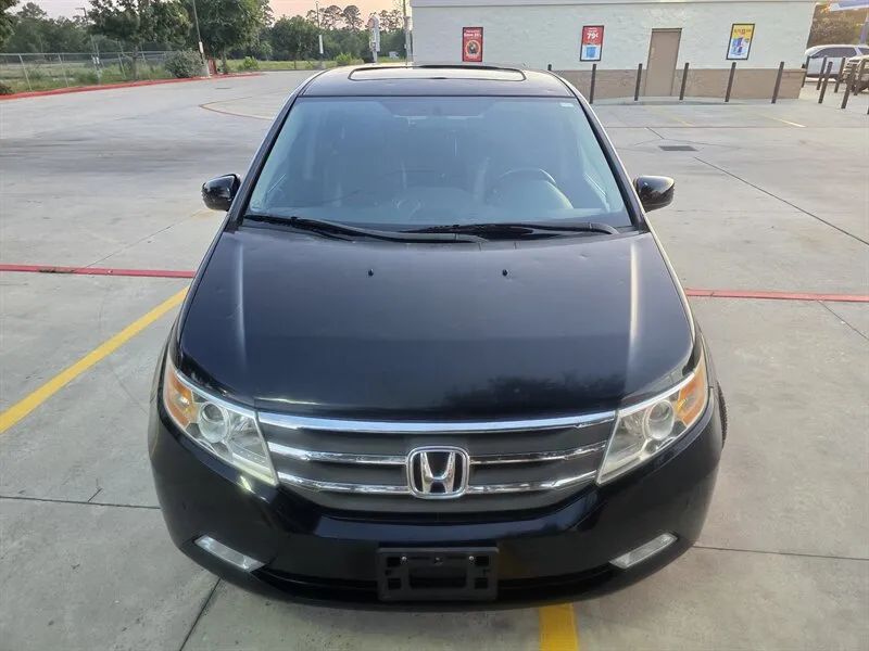 Black 2013 Honda Odyssey Touring Elite front angle near Houston TX