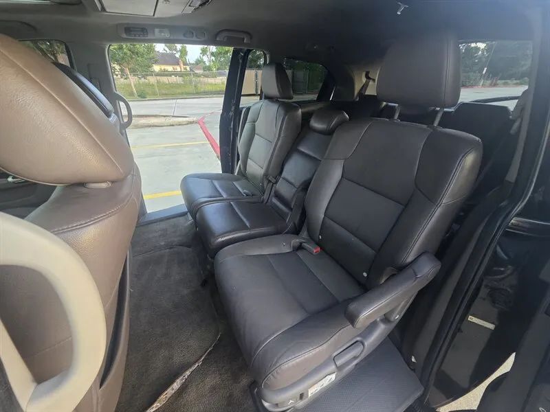 Honda Odyssey second row seating and sliding door opening near Houston TX