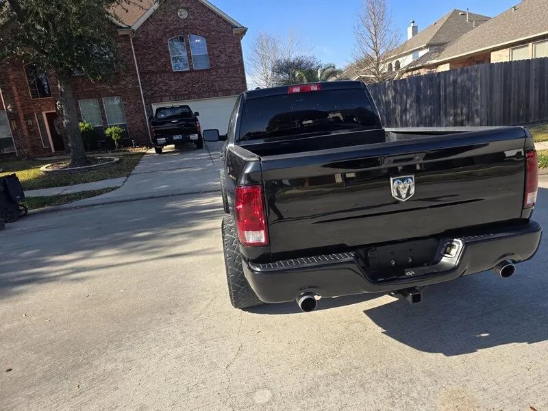 Ram 1500 Quad Cab front angle photo near Houston TX