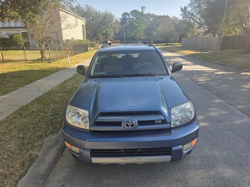 Blue 2004 Toyota 4Runner SR5 front view near Houston TX
