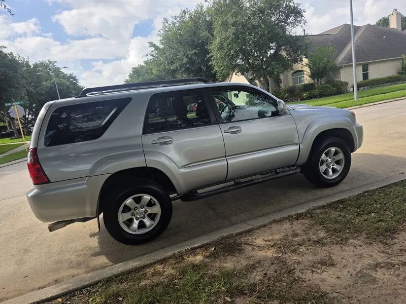 Silver 2006 Toyota 4Runner SR5 side profile near Houston TX