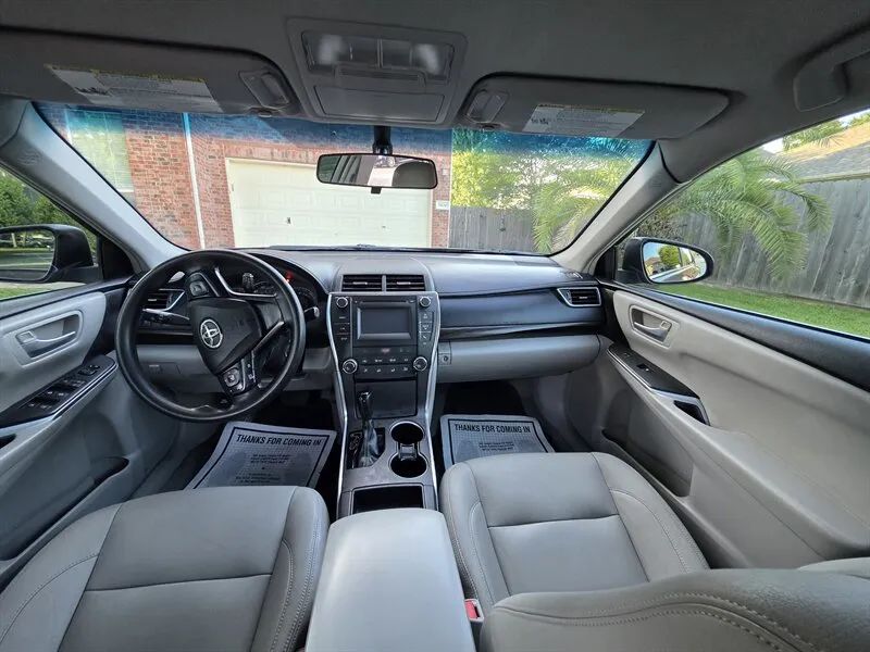 Toyota Camry dashboard and front cabin condition photo near Houston TX