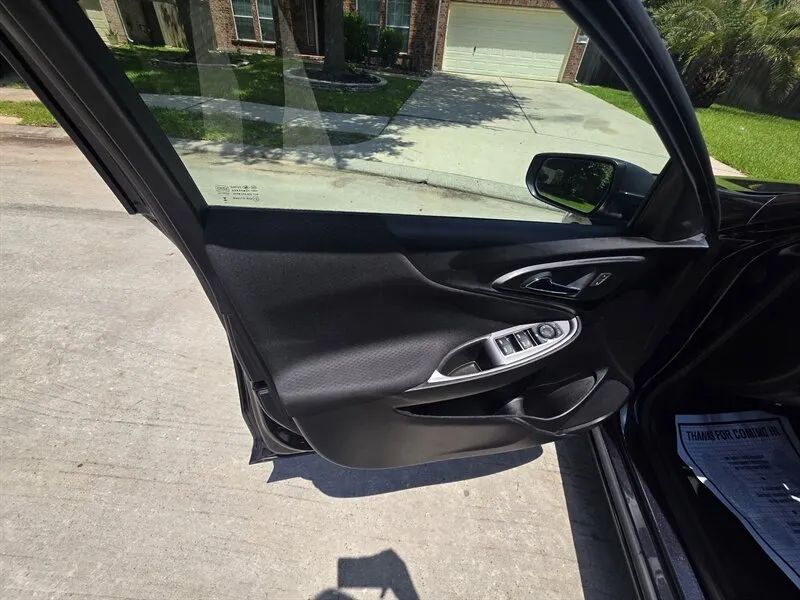 Used sedan interior detail example for Toyota Camry shoppers near Houston TX